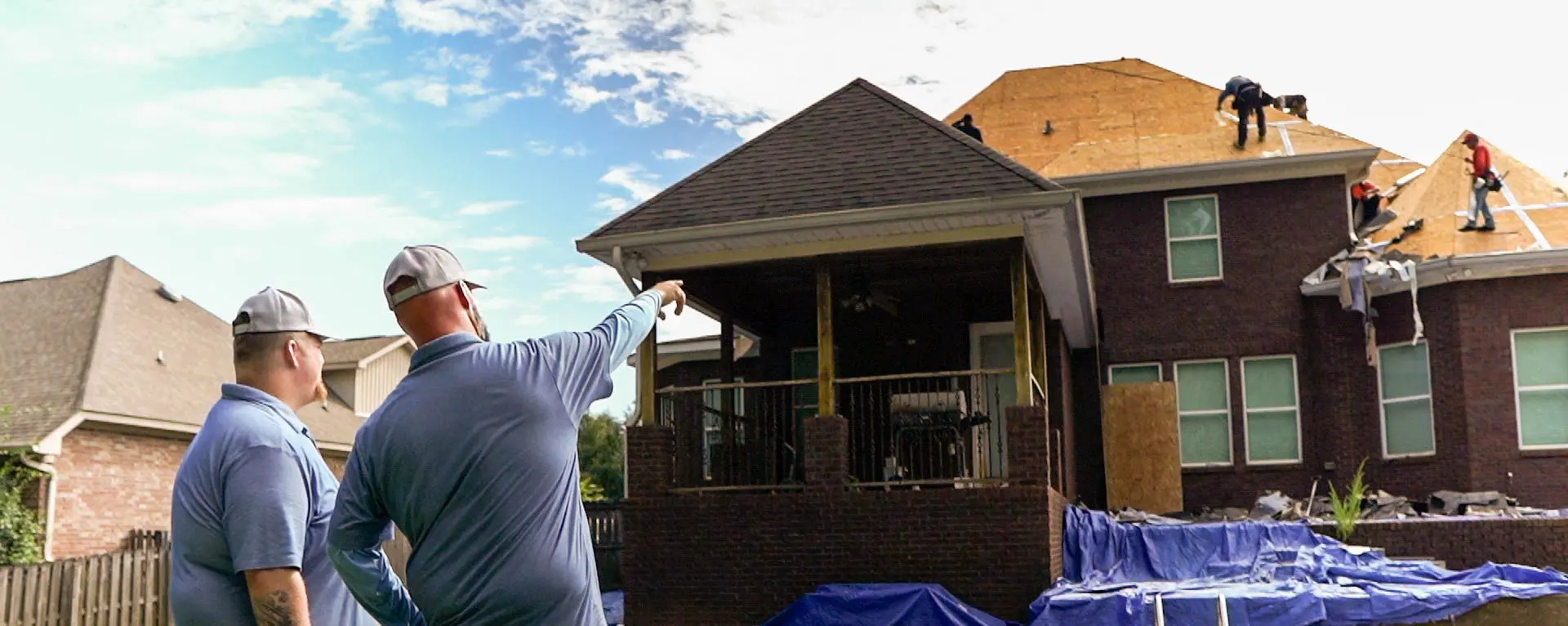 wise builders project managers inspecting a roof