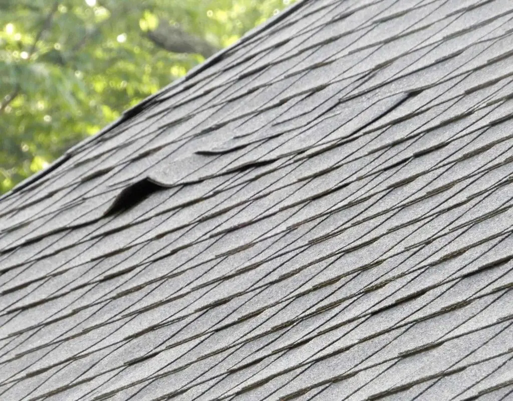 a damage shingle roof that is in need of replacment
