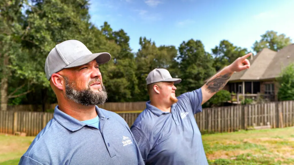 inspecting a roof from the ground