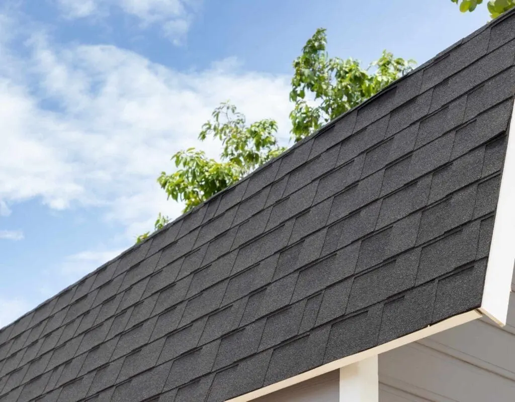 a roof with asphalt shingles