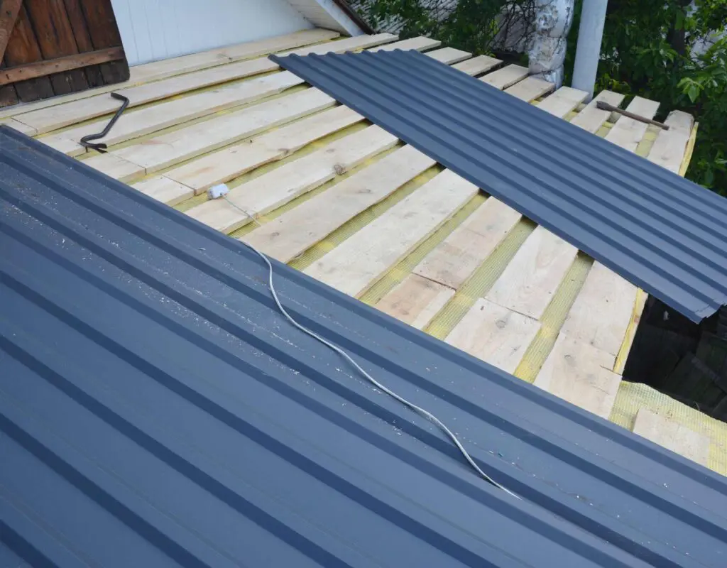 metal roofing systems being installed on a new roof