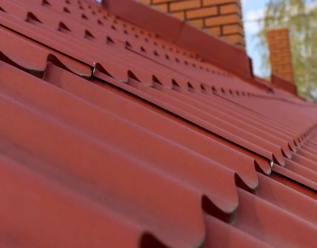 an orange metal roof, one of the types of metal roofs