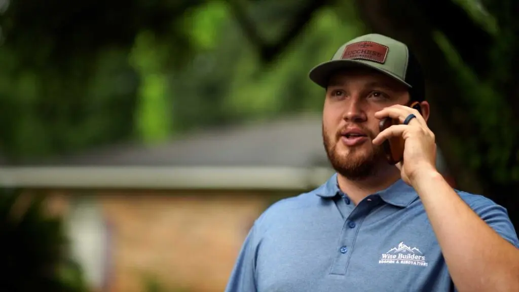 a project manager on the phone with years of experience