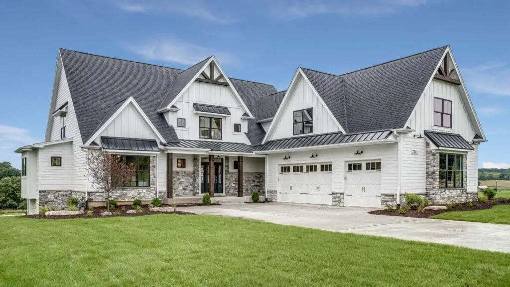 a home with shingles and an attic