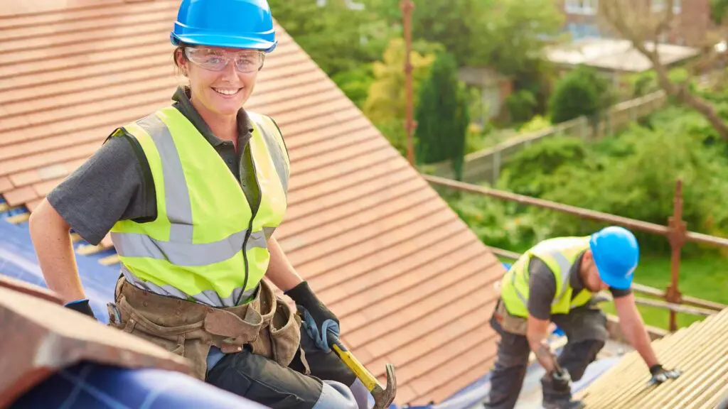 workers installing roof tile