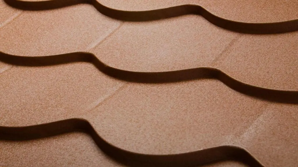 a metal roof that looks like clay tile roofing