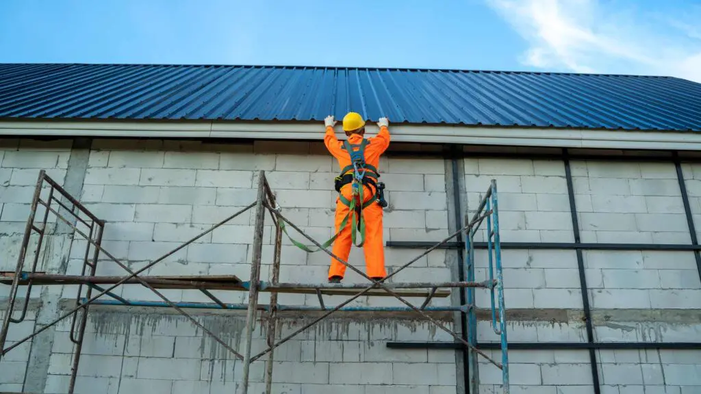 a roofer working on a roof