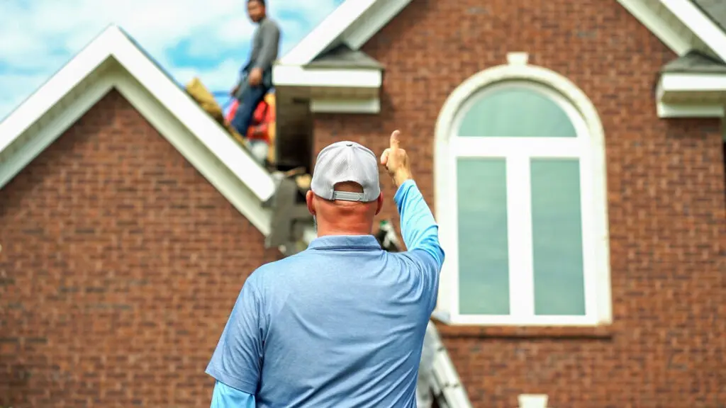 looking at an asphalt roofing job