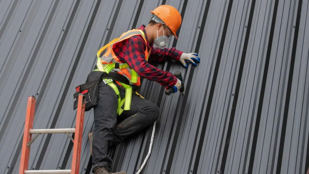 metal roofing professionals installing a roof