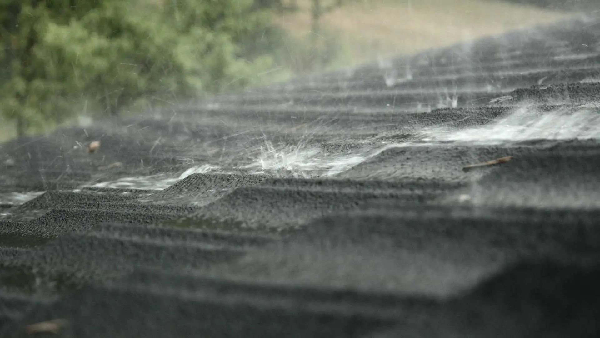 water falling on a roof with insulation