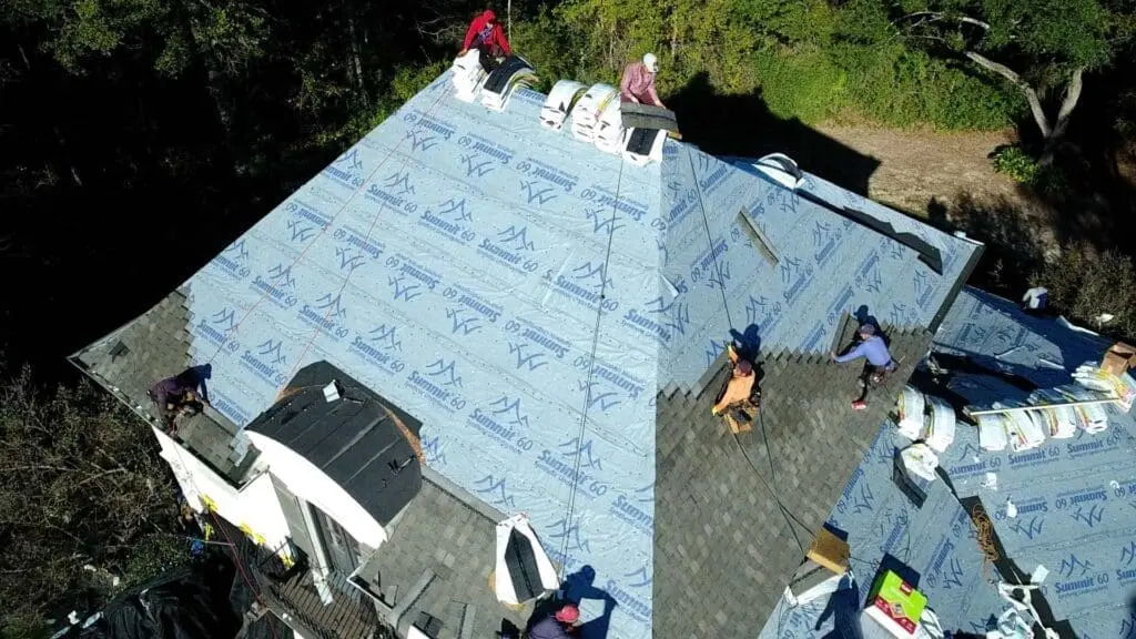 roofers replacing a roof in mobile al