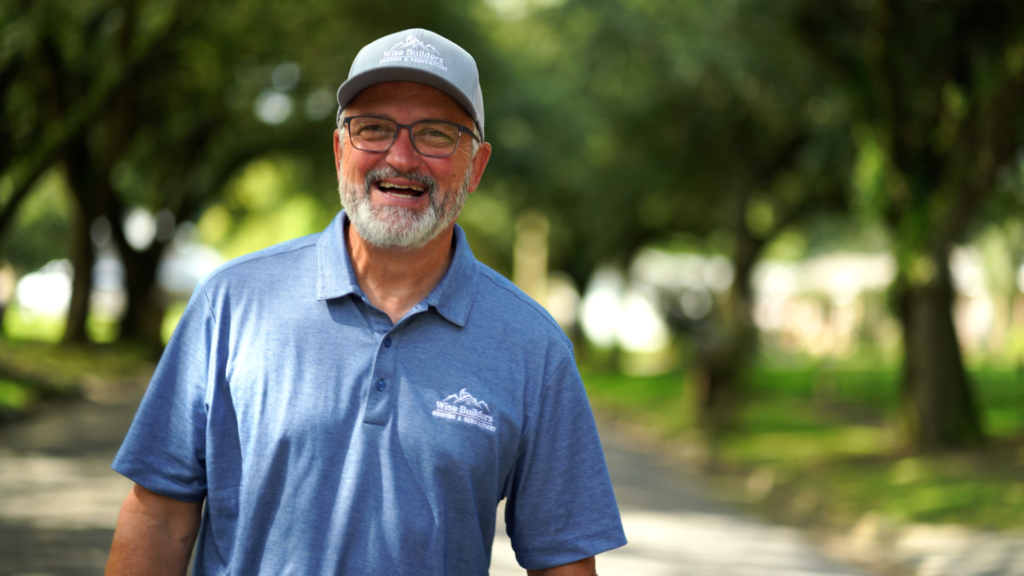 a project manager from Wise Builders Roofing happy to assist customers