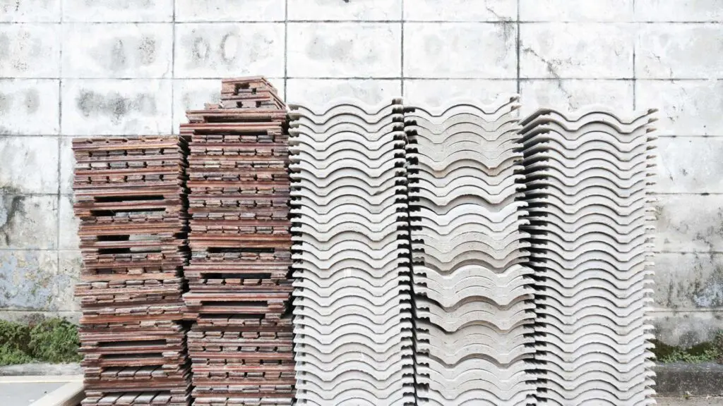 a stack of roofing tiles ready to be installed on a homeowners roof