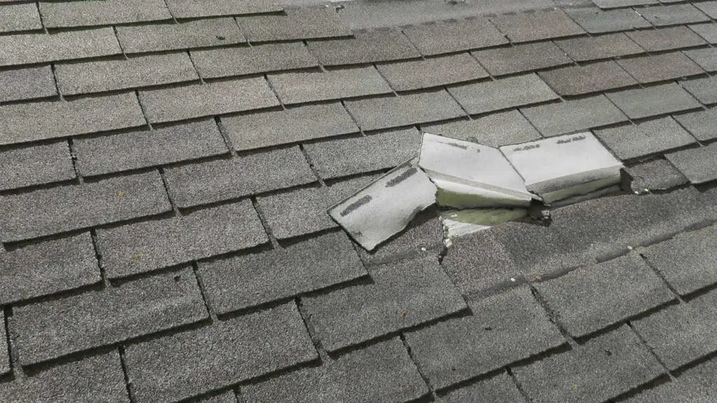 a roof with damage requiring a partial roof replacement