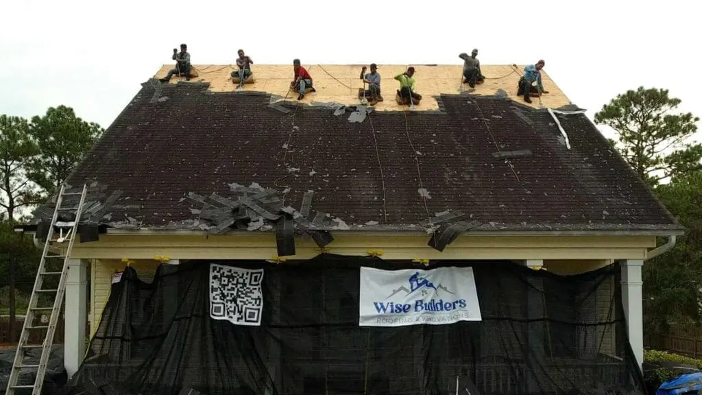 roofers from wise builders replacing every square foot of a roof