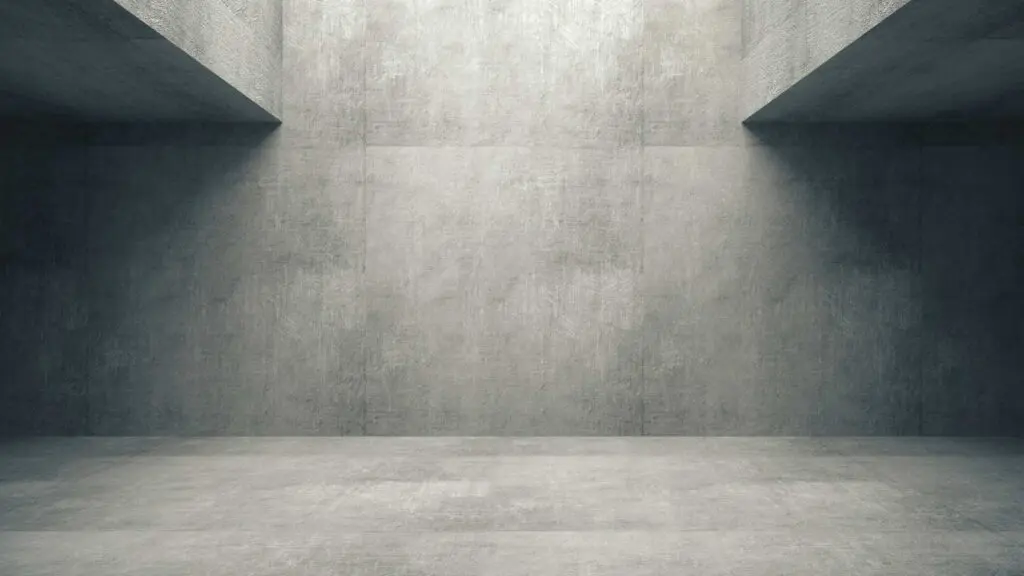 a beautiful grey concrete wall which is a mixture of sand