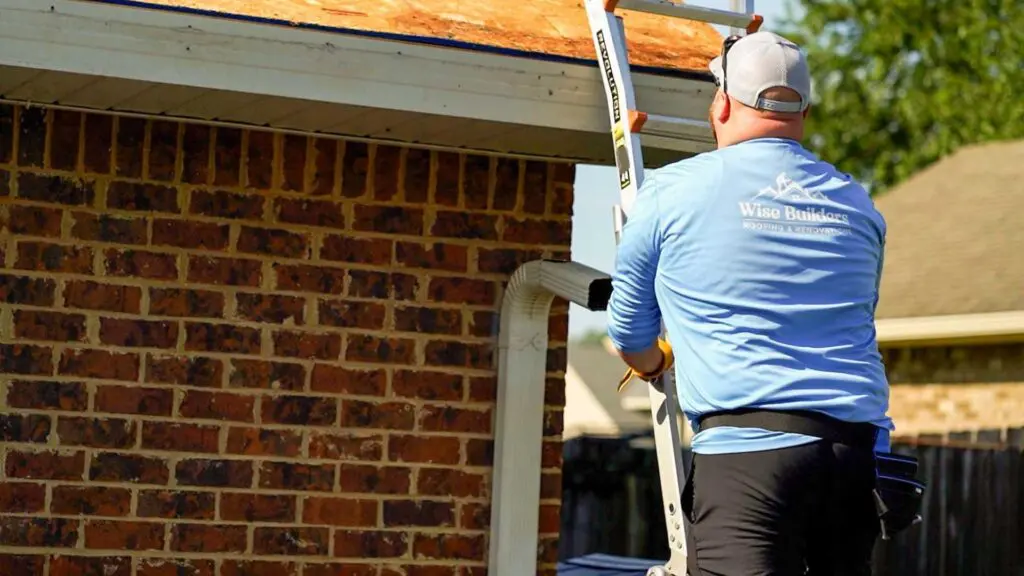 a roofer preparing to inspect a roof