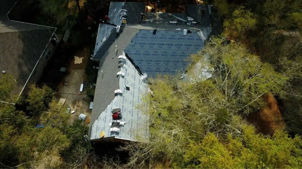 a roof installation happening on a home in mobile al