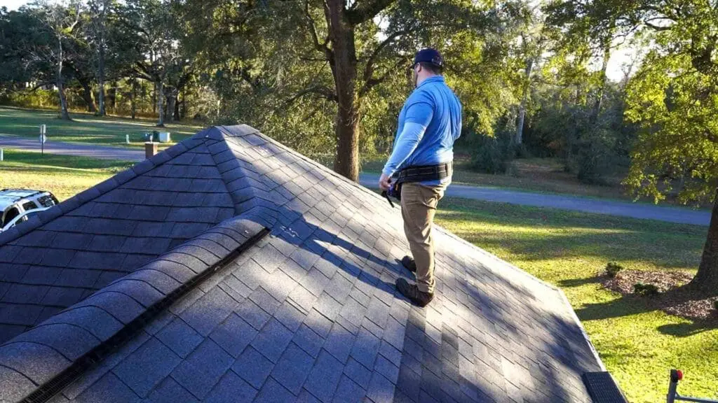 a roofer counting the total number of squares
