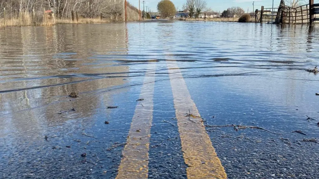 a road with flood damage