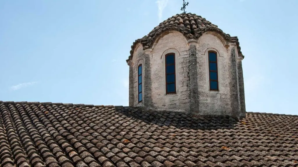a church roofing project with tile shingles