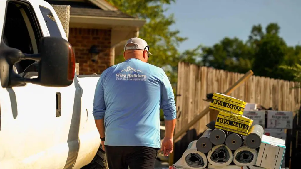 a siding expert from wise builders going over