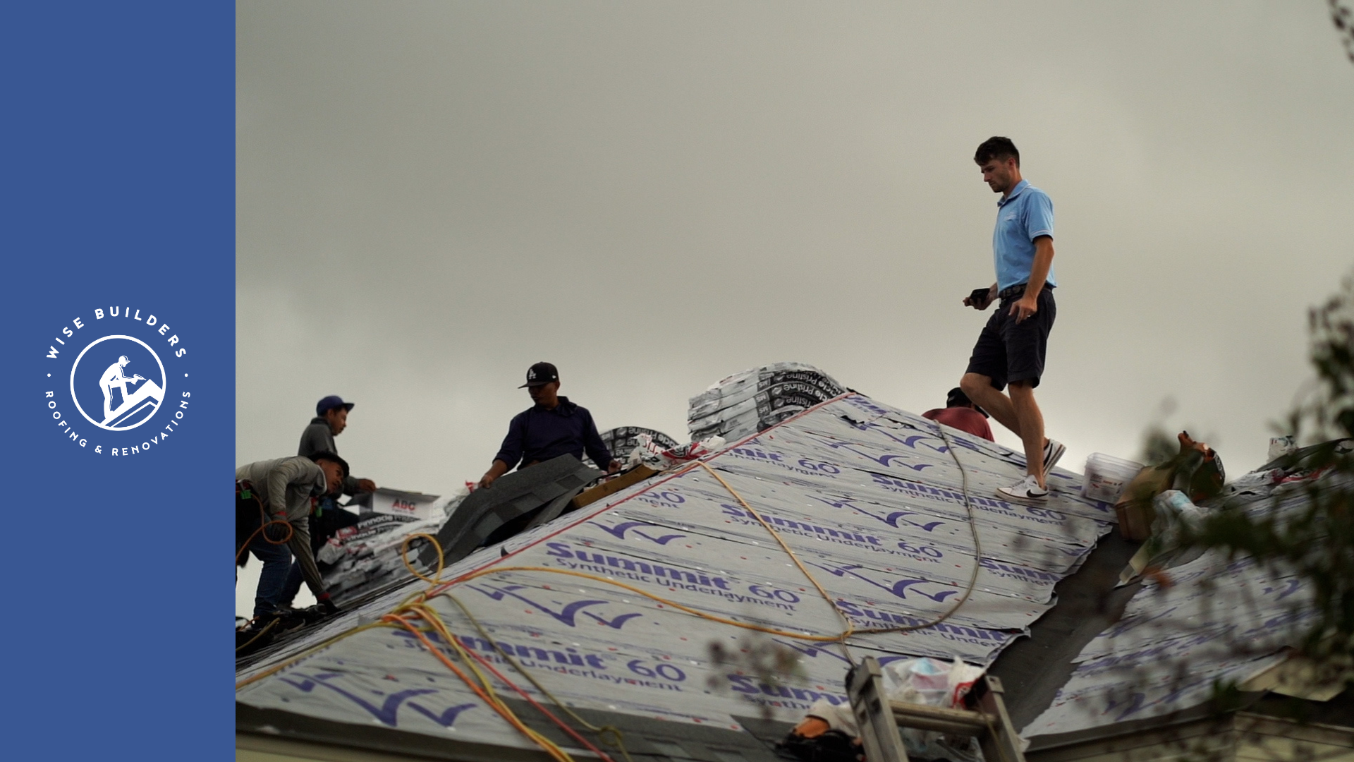 a roofing crew working on a new roof in mobile al