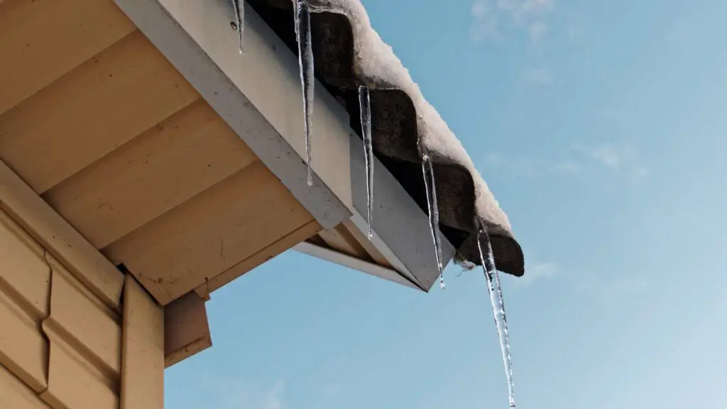 icicles hanging on the side of a roof
