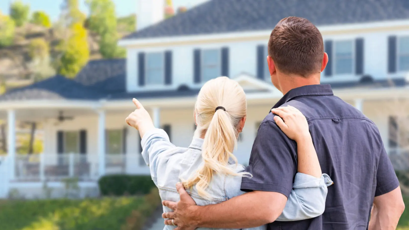 homeowners looking at their new roof