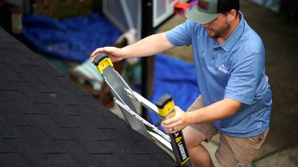 a roofer preparing to inspect every square foot of a roof