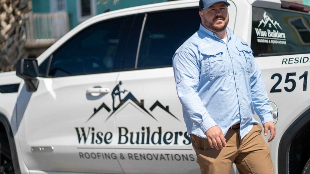 a roofer from wise builders walking away from their truck in daphne alabama