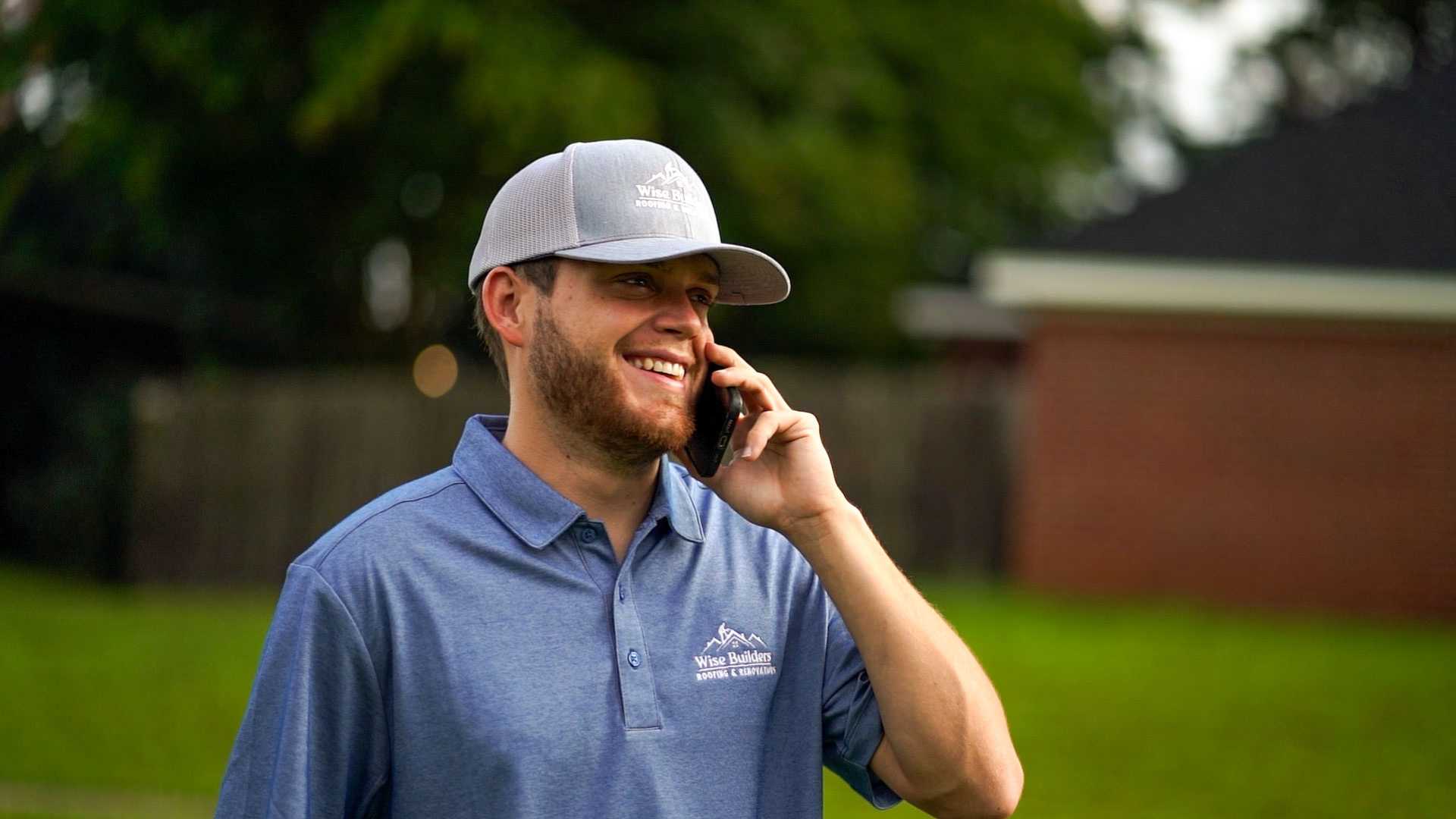 a commercial roofing contractor on the phone with a gaf master elite customer
